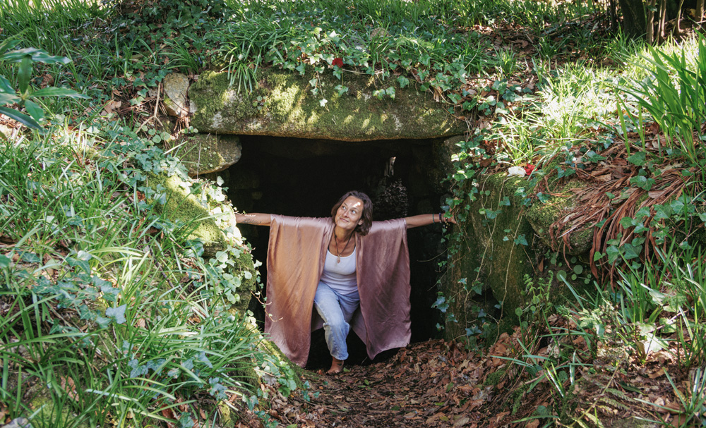 Luisa popping her head out of a cave representing Codes from the Cave